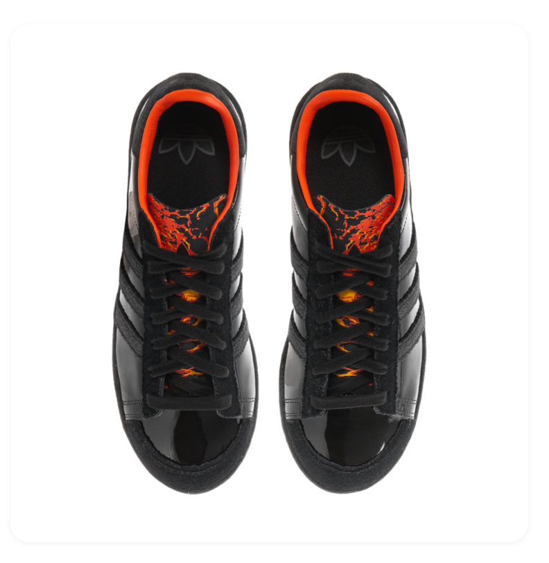 Adidas Black Glossy Sneakers with Orange Lining and Flame-Pattern Tongue