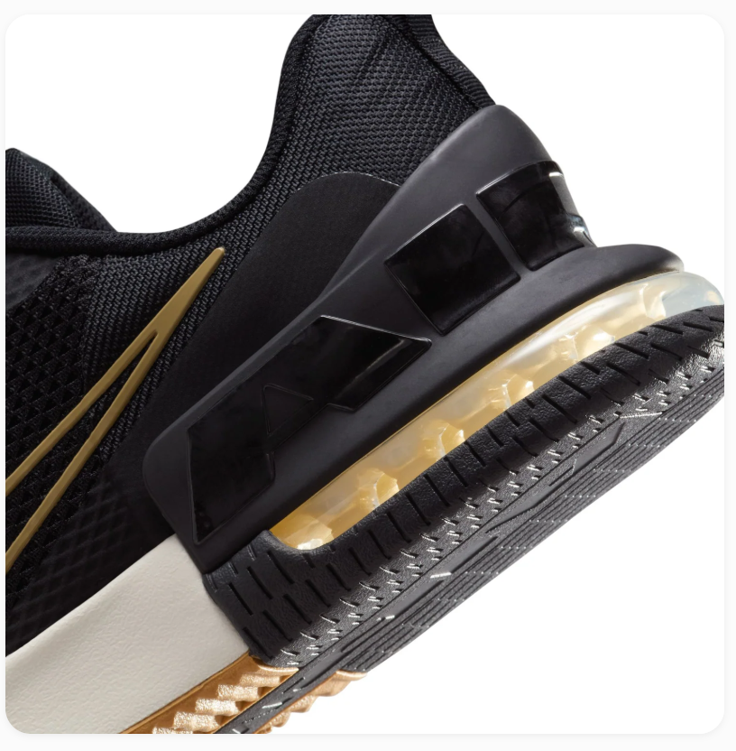 Nike Air Max Black Mesh Sneakers with Gold Accents and Gum Outsole